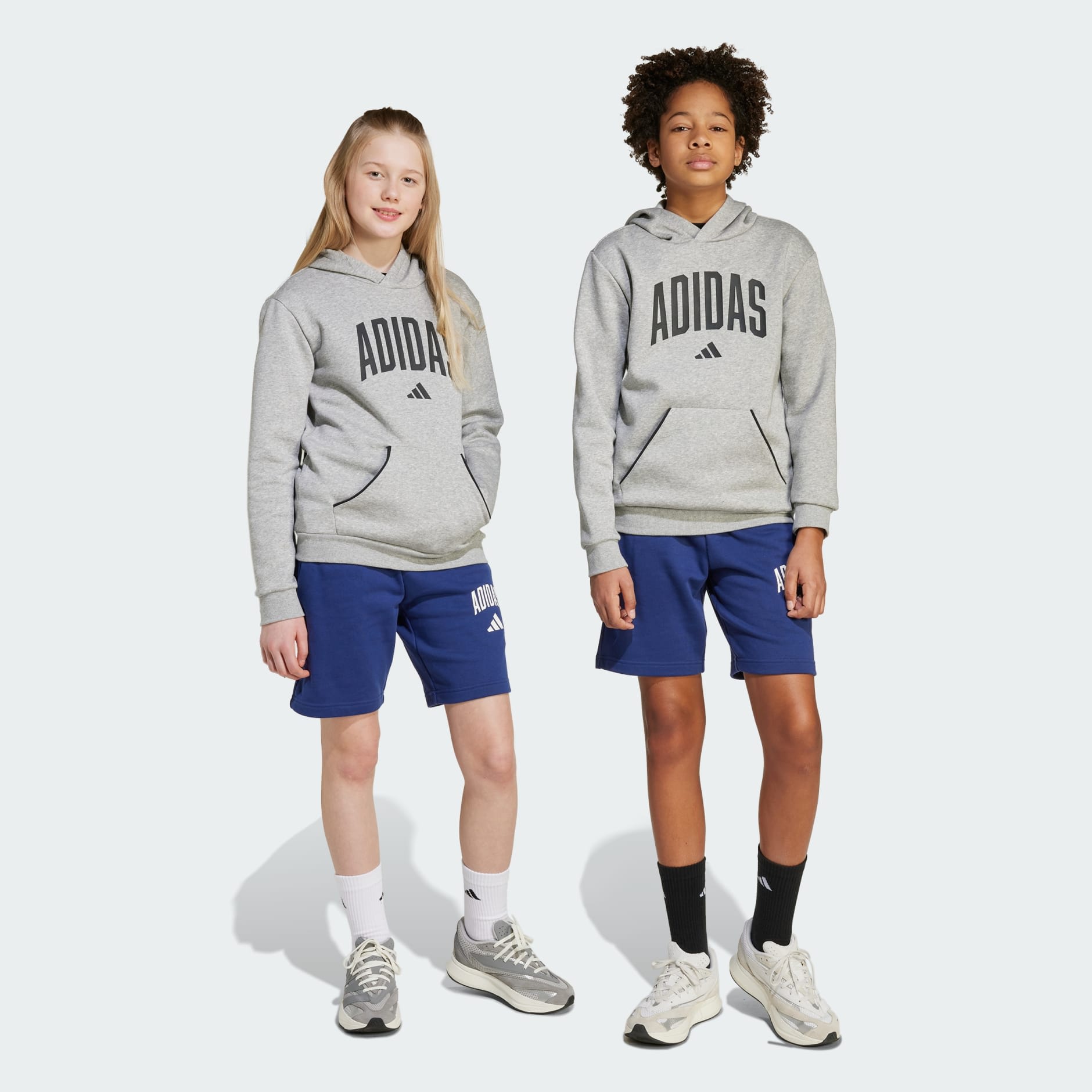 Seasonals_Essentials_Collegiate_Typography_Short_Kids_Blue_JX6593_21_model.jpg
